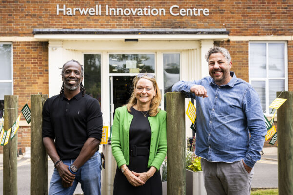 2025: Co-founders of Planet IT, Gavin Jones (pictured left) and Sean Smith (pictured right), reunite with Jo Stevens (centre), MD of Oxford Innovation Space, at the Harwell Innovation Centre’s 25th anniversary event.